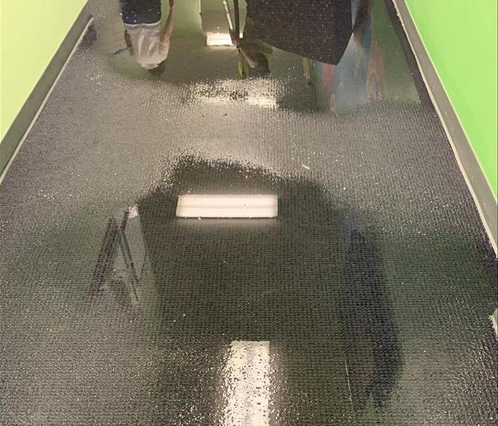Water in hallway of daycare. 